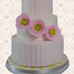 Pink designer wedding cake with flowers